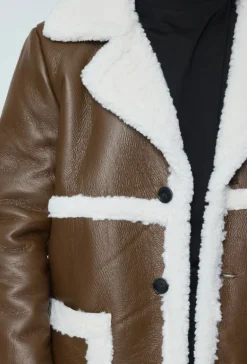Blouson simili moumoute longue