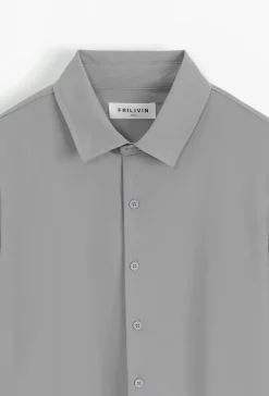 Chemise à manche longues boutonnée pour homme