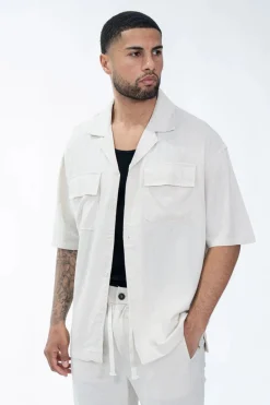 Chemise à manches courtes unie à multiples poches