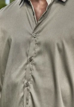 Chemise classique unie à manches longues