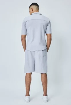Chemise cotelée manches courtes oversize