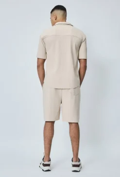 Chemise cotelée manches courtes oversize