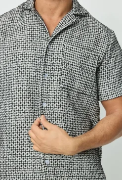 Chemise effet broderie avec des motifs carreaux