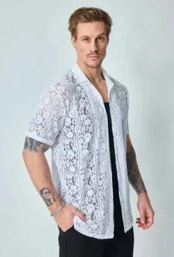 Chemise en dentelle fleurie manches courtes col à revers