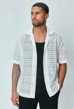 Chemise en dentelle manches courtes col à revers