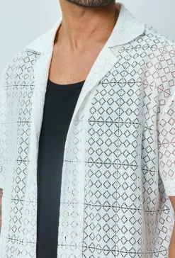 Chemise en dentelle manches courtes col à revers