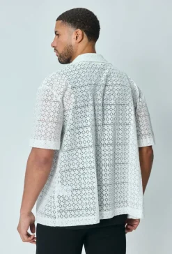 Chemise en dentelle manches courtes col à revers
