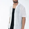 Chemise en maille transparente manches courtes col à revers