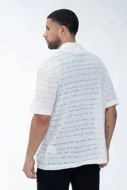 Chemise en maille transparente manches courtes col à revers
