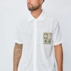 Chemise manches courtes à boutons