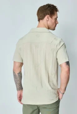 Chemise manches courtes à motifs fleuris
