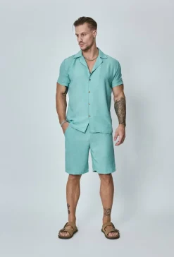 Chemise manches courtes à bouton
