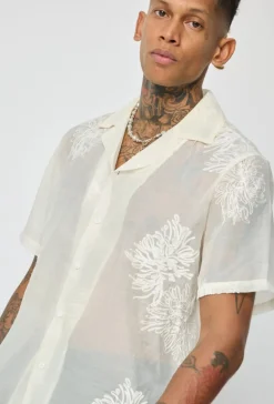 Chemise manches courtes à motifs fleuris broder
