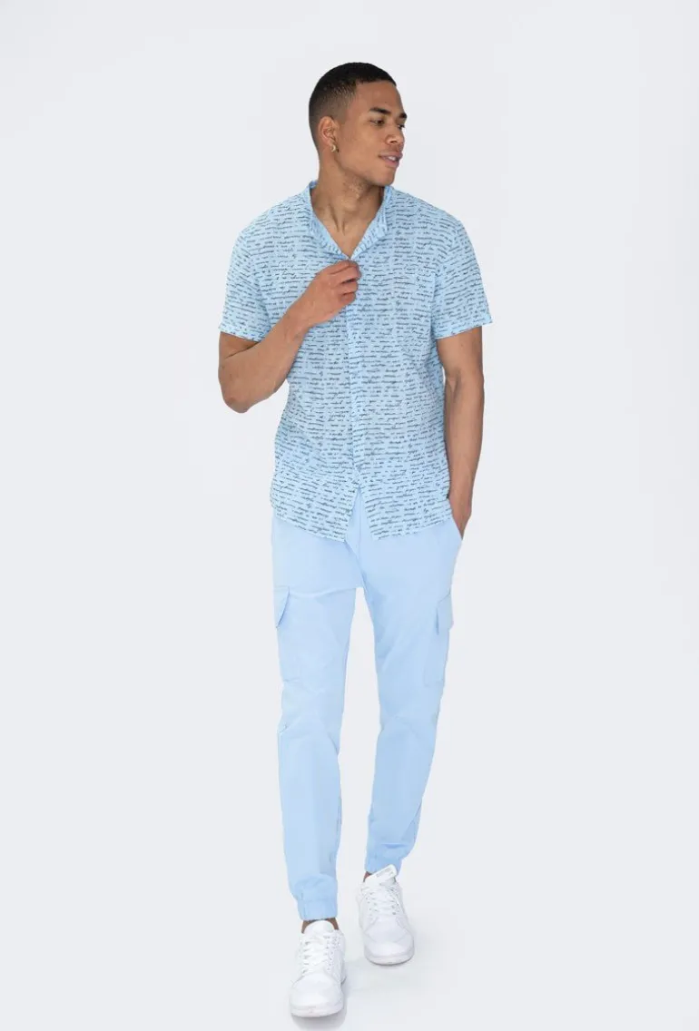 Chemise manches courtes à motifs écriture