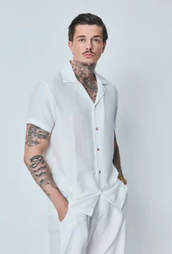 Chemise manches courtes à bouton