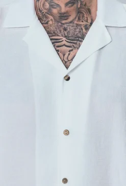 Chemise manches courtes à bouton