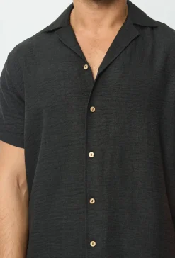 Chemise manches courtes à bouton