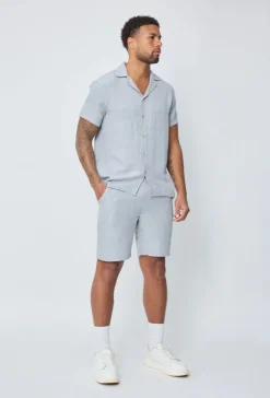 Chemise manches courtes à bouton