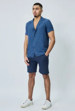 Chemise manches courtes à bouton