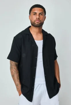 Chemise manches courtes à motifs fleuris