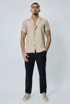 Chemise manches courtes à bouton
