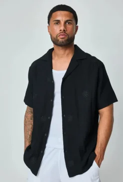 Chemise manches courtes à motifs fleuris