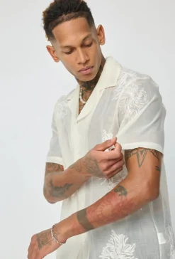 Chemise manches courtes à motifs fleuris broder