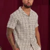 Chemise manches courtes texturée à carreaux