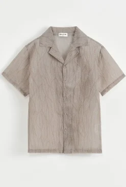 Chemise manches courtes transparente
