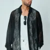 Chemise transparente manches longues à motifs abstraits