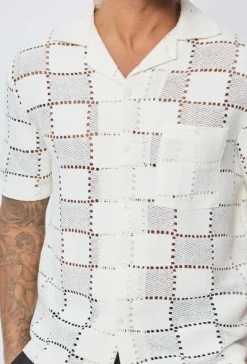 Chemise trouée manches courtes à boutons