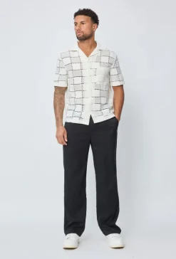 Chemise trouée manches courtes à boutons