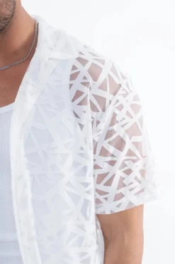 Chemise uni manches courtes transparente
