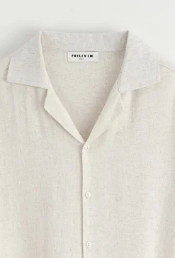Chemise unie à boutons manches courtes