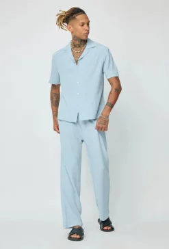 Chemise unie à boutons manches courtes