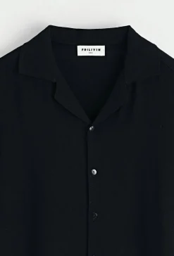 Chemise unie à boutons manches courtes