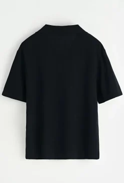 Chemise unie à boutons manches courtes