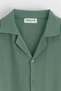Chemise unie à boutons manches courtes