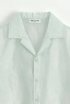 Chemise unie à manches courtes