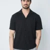 Chemise unie à motif
