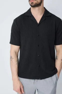 Chemise unie à motif