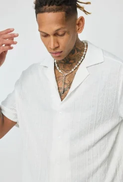 Chemise unie à motif