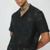 Chemise unie à motif carré