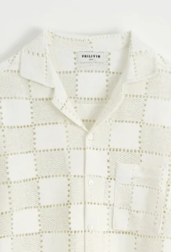 Chemise unie à motif carré