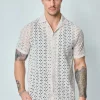 Chemise unie en dentelle manches courtes col à revers