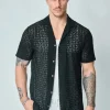 Chemise unie en dentelle manches courtes col à revers
