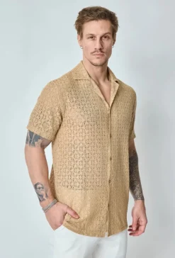 Chemise unie en dentelle manches courtes col à revers