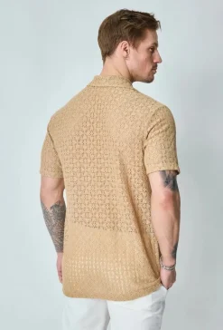 Chemise unie en dentelle manches courtes col à revers
