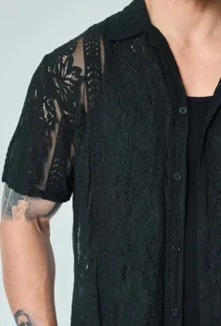 Chemise unie en dentelle manches courtes col à revers