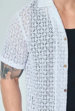 Chemise unie en dentelle manches courtes col à revers